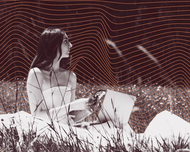 A woman in white sitting in a meadow with a laptop, overlaid with flowing terracotta contour lines